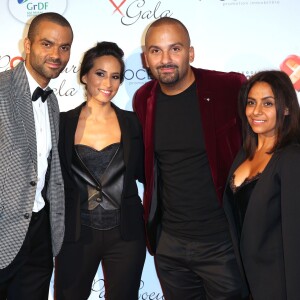 Tony Parker, Axelle Francine, son frère Terence Parker (TJ) et une amie lors du "Par Coeur Gala" pour les 10 ans de l'association "Cekedubonheur" au pavillon d'Armenonville à Paris le 24 septembre 2015