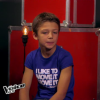 Arthur rejoint l'équipe de Louis Bertignac dans The Voice Kids, le vendredi 2 octobre 2015, sur TF1