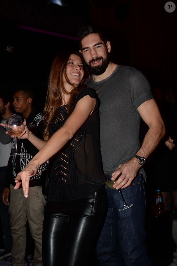 Nikola Karabatic et sa compagne Géraldine Pillet - Les champions du monde de handball fêtent leur victoire au VIP Room à Paris le 2 février 2015.