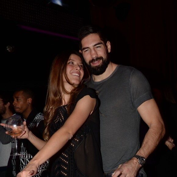 Nikola Karabatic et sa compagne Géraldine Pillet - Les champions du monde de handball fêtent leur victoire au VIP Room à Paris le 2 février 2015.