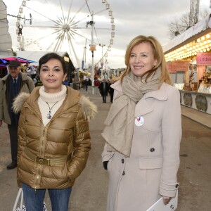 Saïda Jawad et Valérie Trierweiler - Soirée d'ouverture de la "Foire du Trône" au profit de l'association "Secours populaire" à Paris le 27 mars 2015.