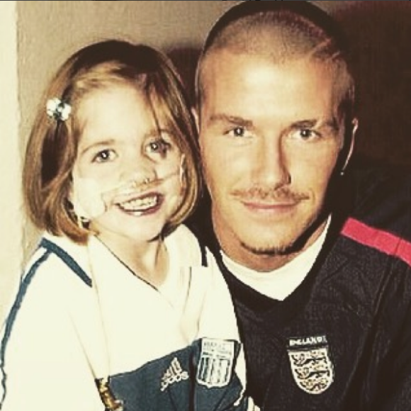David Beckham et la petite Kirsty Howard, en 2002.