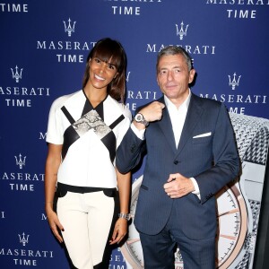 Shy'm et Massimo Carraro, Président du groupe Morellato, assistent à la soirée de présentation de la montre Epoca Squelette par Maserati Time au Motor Village. Paris, le 22 octobre 2015.