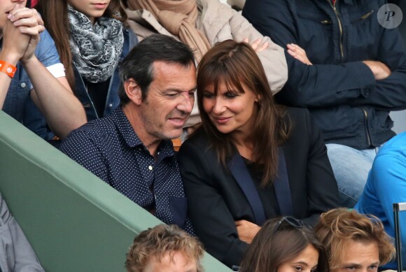 Jean-Luc Reichmann et sa compagne Nathalie aux Internationaux de France de tennis de Roland Garros à Paris le 1er juin 2014.