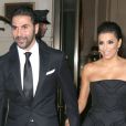 Eva Longoria et son petit ami José Antonio Baston sortent de l'hôtel Ritz Carlton à New York, le 23 septembre 2014.