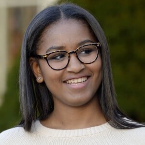 Barack Obama a sauvé une dinde à l'occasion de la fête de Thanksgiving, à la Maison Blanche, en compagnie de ses filles Sasha et Malia, le 25 novembre 2015