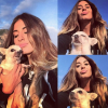 Martika (Bachelor) profite du soleil avec son chien. Novembre 2015.