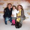 Lara Fabian, sa fille Lou et le père de sa fille Gerard Pullicino au cinéma Gaumont Opéra à Paris, le 1er avril 2012