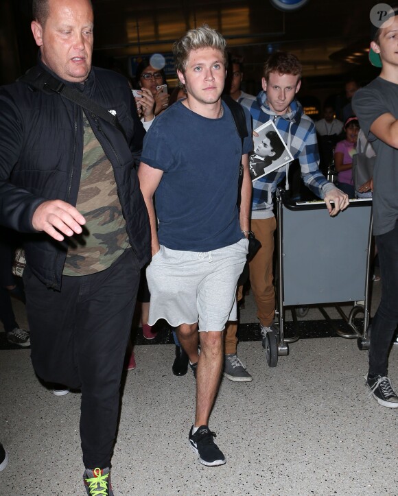 Naill Horan (One Direction) arrive à l'aéroport de Los Angeles très fatigué le 7 juillet 2015.