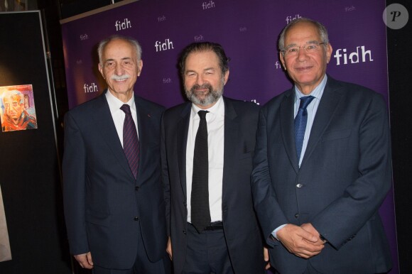 Karim Lahidji (President de la FIDH), Denis Olivennes et Mokhtar Trifi, (Prix Nobel de la Paix, President d'honneur de la Ligue tunisienne des Droits de l'homme) - Dîner de la FIDH (Fédération International des Droits de l'Homme) à l'Hôtel de Ville de Paris le 8 décembre 2015.