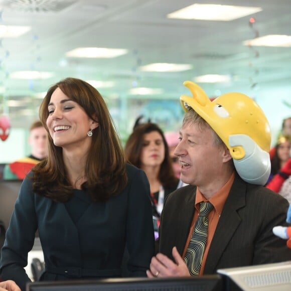 Le prince William et Kate Middleton, la duchesse de Cambridge, à la 23e journée de charité annuelle (Fancy Dress Charity Day) de l'ICAP à Londres, le 9 décembre 2015.