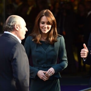 Le prince William, duc de Cambridge et Kate Middleton, duchesse de Cambridge soutiennent la journée de charité de l'ICAP à Londres le 9 décembre 2015.