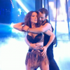 Fabienne Carat danse avec deux partenaires, dans Danse avec les stars 6 sur TF1, le samedi 12 décembre 2015.