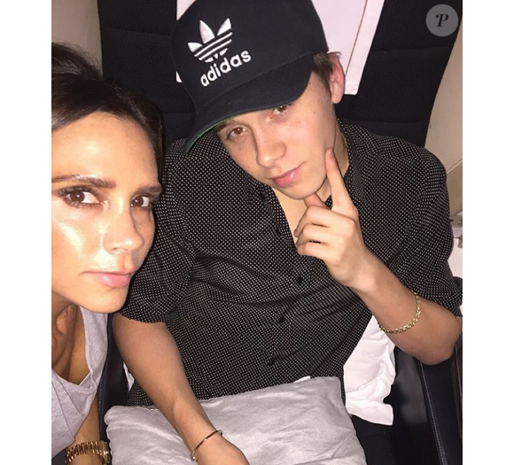 Victoria Beckham et son fils Brooklyn / photo postée sur Instagram, le 9 décembre 2015.