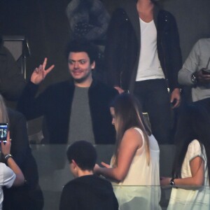 Kev Adams, Black M (Black Mesrimes, né Alpha Diallo) et Rayane Bensetti au concert de Maître Gims à l'AccorHotels Arena (Bercy) à Paris le 14 décembre 2015
