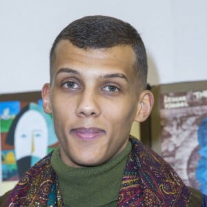 Le chanteur Stromae au défilé de mode hommes Valentino collection prêt-à-porter Automne Hiver 2015/2016 à l'hôtel Salomon de Rothschild à Paris, le 21 janvier 2015