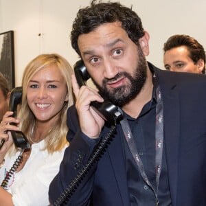 Cyril Hanouna et Enora Malagré - 11e édition du "BGC Charity Day" à Paris le 11 septembre 2015 en mémoire aux 658 collaborateurs du groupe BGC partners (leader mondial du courtage interbancaire) disparus il y a 14 ans dans les attentats du World Trade Center le 11 septembre 2001.