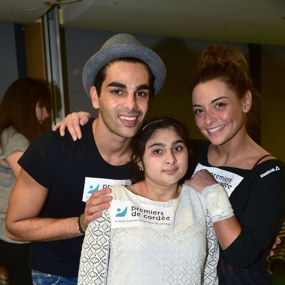Exclusif - La chanteuse Priscilla Betti et Christophe Licata participent à l'opération "Danse à l'hôpital" avec les jeunes de la Fondation Santé des Etudiants de France, pour l'association "Premiers de Cordée" à la clinique médicale et pédagogique Edouard Rist à Paris, le 17 décembre 2015. © Giancarlo Gorassini/Bestimage