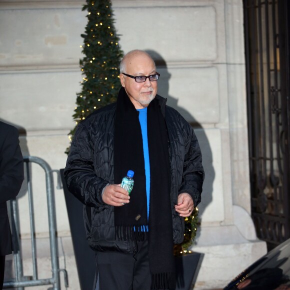 Rene Angelil, le mari de Celine Dion - Celine Dion et sa famille a la sortie de leur hotel a Paris. La diva Quebecoise a fini sa tournee et quitte la France. le 7 decembre 2013