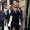 Celine Dion et sa famille a la sortie de leur hotel a Paris. La diva Quebecoise a fini sa tournee et quitte la France. le 7 decembre 2013