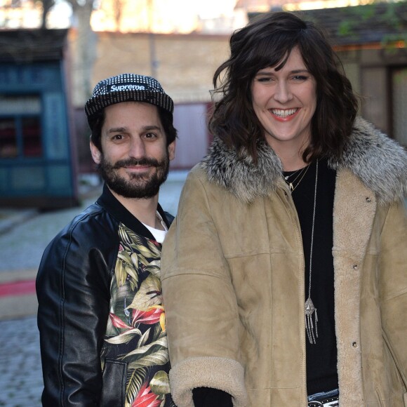 Daphné Bürki et son compagnon Sylvain Quimène (alias Gunther Love), à Paris, le 28 mars 2014.
