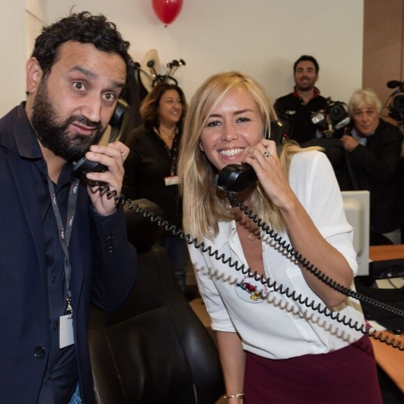 Cyril Hanouna et Enora Malagré - 11e édition du "BGC Charity Day" à Paris le 11 septembre 2015 en mémoire aux 658 collaborateurs du groupe BGC partners (leader mondial du courtage interbancaire) disparus il y a 14 ans dans les attentats du World Trade Center le 11 septembre 2001.