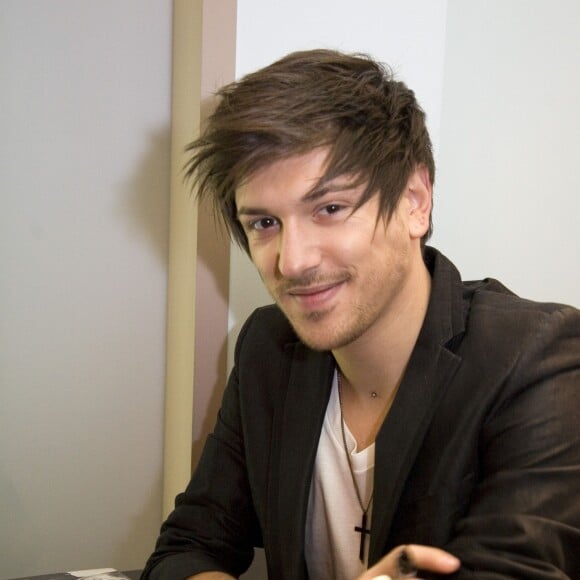 Quentin Mosimann lors du lancement de sa gamme de bijoux et tee-shirts Change Your Minde à Paris, le 2 décembre 2011