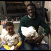 Bafétimbi Gomis, son petite Dione et la petite dernière Yzatis - Photo publiée le 28 janvier 2016