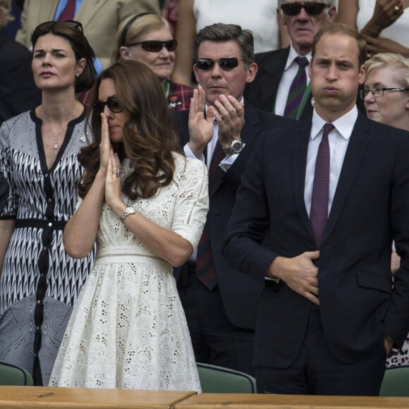 Kate Middleton et le prince William à Wimbledon le 2 juillet 2014 lors de l'élimination d'Andy Murray en quart de finale par Grigor Dimitrov. La duchesse de Cambridge devrait reprendre le flambeau de la reine Elizabeth II comme marraine du All England Lawn Tennis and Croquet Club.