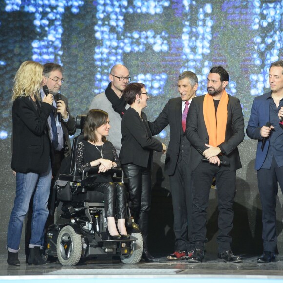 Gad Elmaleh, Sophie Davant , Nagui, Garou et Cyril Hanouna - 28e Téléthon au Champ de Mars à Paris le 6 décembre 2014.