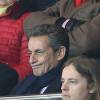 Nicolas Sarkozy et son fils Pierre Sarkozy - People au match de football PSG - Lille au Parc des Princes le 13 février 2016 © Cyril Moreau / Bestimage
