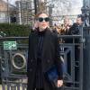 Olivia Palermo assiste au défilé Topshop Unique à Londres, habillée d'un top, d'un pantalon rayés et d'un gilet Topshop, d'un pull à col roulé Tibi et de chaussures Tabitha Simmons. Des lunettes de soleil Christian Dior et un sac Topshop accessoirisent sa tenue. Londres, le 21 février 2016.