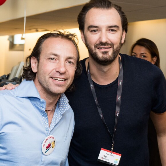 Philippe Candeloro, Cyril Lignac - 11e édition du "BGC Charity Day" à Paris le 11 septembre 2015 en mémoire aux 658 collaborateurs du groupe BGC partners (leader mondial du courtage interbancaire) disparus il y a 14 ans dans les attentats du World Trade Center le 11 septembre 2001.