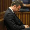 Oscar Pistorius en pleurs dans le box des accusés de la haute cour de Pretroia, le 11 septembre 2014