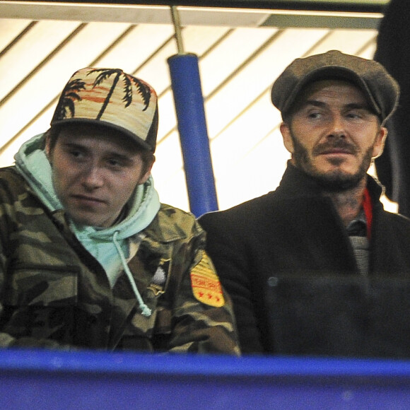 David Beckham et son fils Brooklyn - People au match des 1/8 de finale de la Ligue Champions entre Chelsea et le PSG à Londres le 9 mars 2016. Le PSG à battu Chelsea sur le score de 2-1 et se qualifie pour les quarts de finale de la Ligue des Champions. © Pierre Perusseau/Bestimage