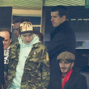 David Beckham et son fils Brooklyn - People au match des 1/8 de finale de la Ligue Champions entre Chelsea et le PSG à Londres le 9 mars 2016. Le PSG à battu Chelsea sur le score de 2-1 et se qualifie pour les quarts de finale de la Ligue des Champions. © Pierre Perusseau/Bestimage