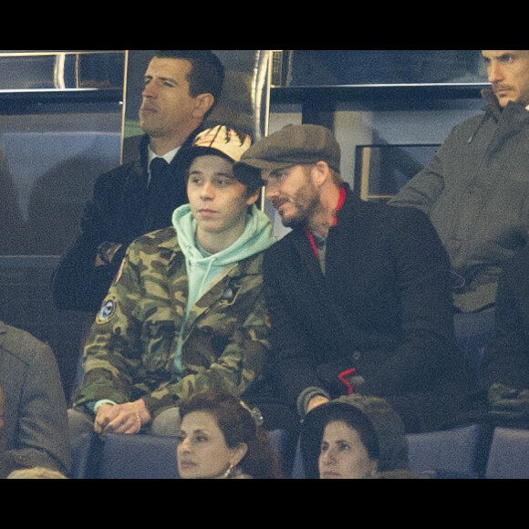 David Beckham et son fils Brooklyn - People au match des 1/8 de finale de la Ligue Champions entre Chelsea et le PSG à Londres le 9 mars 2016. Le PSG à battu Chelsea sur le score de 2-1 et se qualifie pour les quarts de finale de la Ligue des Champions. © Pierre Perusseau/Bestimage