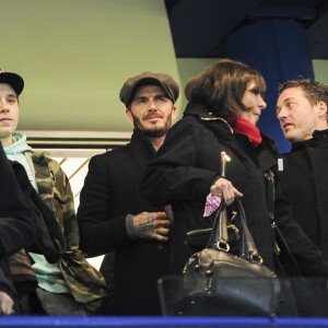 David Beckham et son fils Brooklyn - People au match des 1/8 de finale de la Ligue Champions entre Chelsea et le PSG à Londres le 9 mars 2016. Le PSG à battu Chelsea sur le score de 2-1 et se qualifie pour les quarts de finale de la Ligue des Champions. © Pierre Perusseau/Bestimage