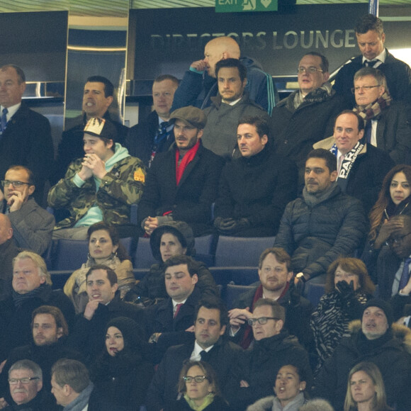 David Beckham et son fils Brooklyn - People au match des 1/8 de finale de la Ligue Champions entre Chelsea et le PSG à Londres le 9 mars 2016. Le PSG à battu Chelsea sur le score de 2-1 et se qualifie pour les quarts de finale de la Ligue des Champions. © Pierre Perusseau/Bestimage