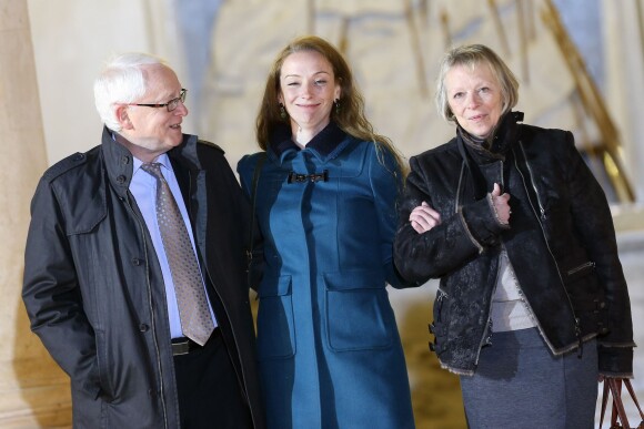 Florence Cassez avec ses parents Bernard et Charlotte Cassez au Palais de l'Elysée avant un entretien privé avec le président François Hollande à Paris le 25 janvier 2013.