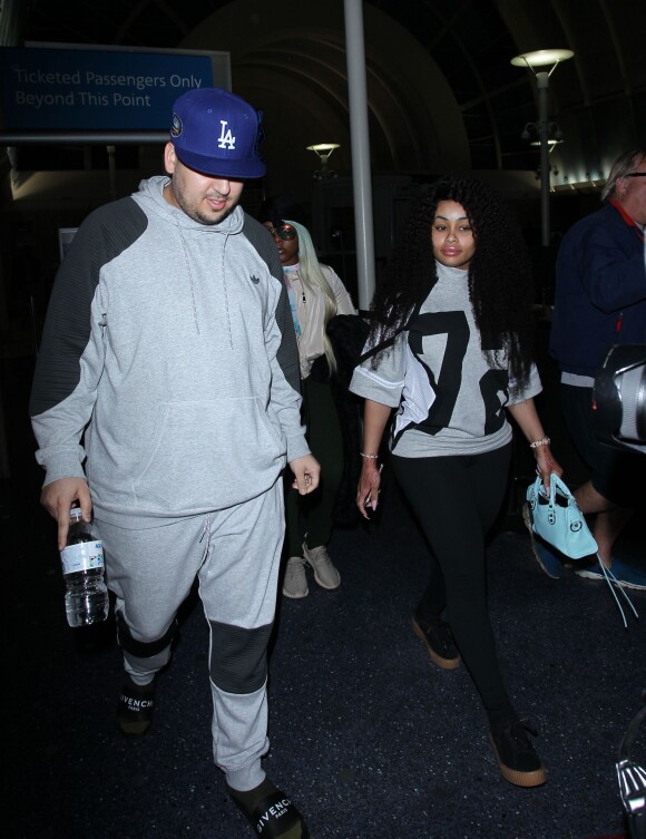 Rob Kardashian et sa compagne Blac Chyna arrivent à l'aéroport LAX de Los Angeles. Le 14 mars 2016