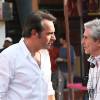 Jean Dujardin et Claude Lelouch en discussion sur le tournage d'Un + Une.