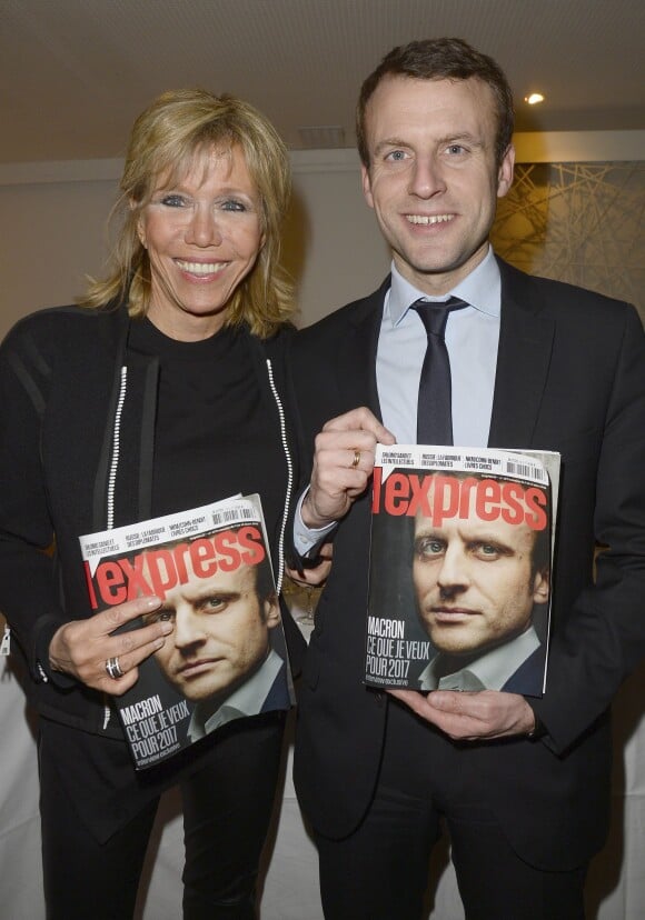 Brigitte et Emmanuel Macron à la soirée de lancement de la nouvelle formule de l'Express au restaurant la Maison Blanche à Paris le 8 mars 2016