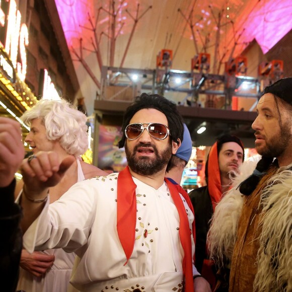 Exclusif - Jour 2 - Cyril Hanouna, Camille Combal et leurs cinq chroniqueurs se promènent sur la Fremont Street Experience à Las Vegas le 1er avril 2016. Moktar Guetari s'est déguisé en indien, Cyril Hanouna en Elvis Presley, Jean-Michel Maire en Oncle Sam, Camille Combal en boxeur, Isabelle Morini-Bosc en machine à sous, Matthieu Delormeau en Marilyn Monroe et Gilles Verdez en catcheur. Cyril Hanouna et son futur époux Camille Combal sont partis à Las Vegas le jeudi 31 mars 2016 pour célébrer leur mariage le samedi 2 avril 2016. Jean-Michel Maire, Isabelle Morini-Bosc, Matthieu Delormeau, Moktar Guetari et Gilles Verdez étaient les cinq chroniqueurs qui les accompagnaient ainsi que des invités de l'émission "Touche pas à mon poste !" choisis dans le public.