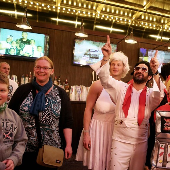 Exclusif - Jour 2 - Cyril Hanouna, Camille Combal et leurs cinq chroniqueurs se promènent sur la Fremont Street Experience à Las Vegas le 1er avril 2016. Moktar Guetari s'est déguisé en indien, Cyril Hanouna en Elvis Presley, Jean-Michel Maire en Oncle Sam, Camille Combal en boxeur, Isabelle Morini-Bosc en machine à sous, Matthieu Delormeau en Marilyn Monroe et Gilles Verdez en catcheur. Cyril Hanouna et son futur époux Camille Combal sont partis à Las Vegas le jeudi 31 mars 2016 pour célébrer leur mariage le samedi 2 avril 2016. Jean-Michel Maire, Isabelle Morini-Bosc, Matthieu Delormeau, Moktar Guetari et Gilles Verdez étaient les cinq chroniqueurs qui les accompagnaient ainsi que des invités de l'émission "Touche pas à mon poste !" choisis dans le public.