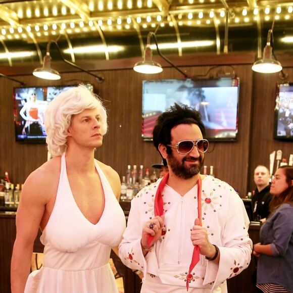 Exclusif - Jour 2 - Cyril Hanouna, Camille Combal et leurs cinq chroniqueurs se promènent sur la Fremont Street Experience à Las Vegas le 1er avril 2016. Moktar Guetari s'est déguisé en indien, Cyril Hanouna en Elvis Presley, Jean-Michel Maire en Oncle Sam, Camille Combal en boxeur, Isabelle Morini-Bosc en machine à sous, Matthieu Delormeau en Marilyn Monroe et Gilles Verdez en catcheur. Cyril Hanouna et son futur époux Camille Combal sont partis à Las Vegas le jeudi 31 mars 2016 pour célébrer leur mariage le samedi 2 avril 2016. Jean-Michel Maire, Isabelle Morini-Bosc, Matthieu Delormeau, Moktar Guetari et Gilles Verdez étaient les cinq chroniqueurs qui les accompagnaient ainsi que des invités de l'émission "Touche pas à mon poste !" choisis dans le public.