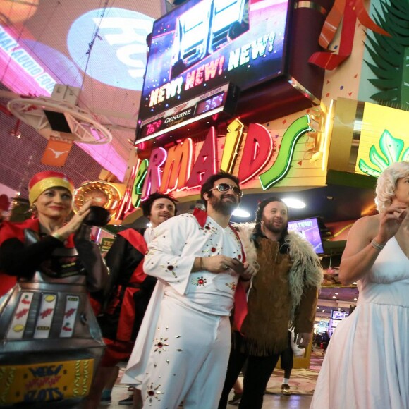 Exclusif - Jour 2 - Cyril Hanouna, Camille Combal et leurs cinq chroniqueurs se promènent sur la Fremont Street Experience à Las Vegas le 1er avril 2016. Moktar Guetari s'est déguisé en indien, Cyril Hanouna en Elvis Presley, Jean-Michel Maire en Oncle Sam, Camille Combal en boxeur, Isabelle Morini-Bosc en machine à sous, Matthieu Delormeau en Marilyn Monroe et Gilles Verdez en catcheur. Cyril Hanouna et son futur époux Camille Combal sont partis à Las Vegas le jeudi 31 mars 2016 pour célébrer leur mariage le samedi 2 avril 2016. Jean-Michel Maire, Isabelle Morini-Bosc, Matthieu Delormeau, Moktar Guetari et Gilles Verdez étaient les cinq chroniqueurs qui les accompagnaient ainsi que des invités de l'émission "Touche pas à mon poste !" choisis dans le public.