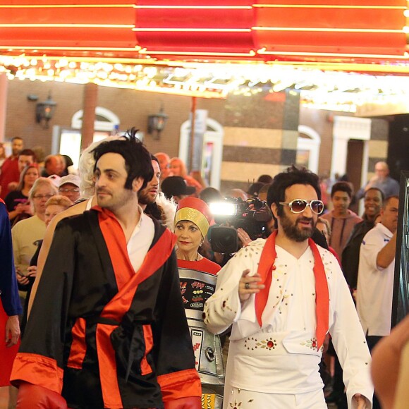 Exclusif - Jour 2 - Cyril Hanouna, Camille Combal et leurs cinq chroniqueurs se promènent sur la Fremont Street Experience à Las Vegas le 1er avril 2016. Moktar Guetari s'est déguisé en indien, Cyril Hanouna en Elvis Presley, Jean-Michel Maire en Oncle Sam, Camille Combal en boxeur, Isabelle Morini-Bosc en machine à sous, Matthieu Delormeau en Marilyn Monroe et Gilles Verdez en catcheur. Cyril Hanouna et son futur époux Camille Combal sont partis à Las Vegas le jeudi 31 mars 2016 pour célèbrer leur mariage le samedi 2 avril 2016. Jean-Michel Maire, Isabelle Morini-Bosc, Matthieu Delormeau, Moktar Guetari et Gilles Verdez étaient les cinq chroniqueurs qui les accompagnaient ainsi que des invités de l'émission "Touche pas à mon poste !" choisis dans le public.