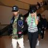 Tyga et sa compagne Kylie Jenner, les cheveux verts, arrivent à l'aéroport LAX de Los Angeles. Le 16 septembre 2015
