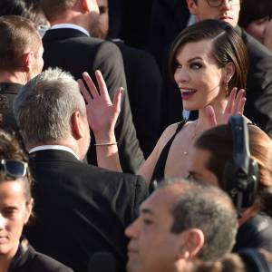 Milla Jovovich, face à Luc Besson, à la montée des marches du film "The Last Face" lors du 69ème Festival International du Film de Cannes le 20 mai 2016. © Lionel Urman / Bestimage